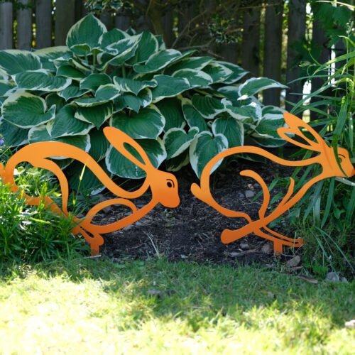 hares garden sculpture - orange