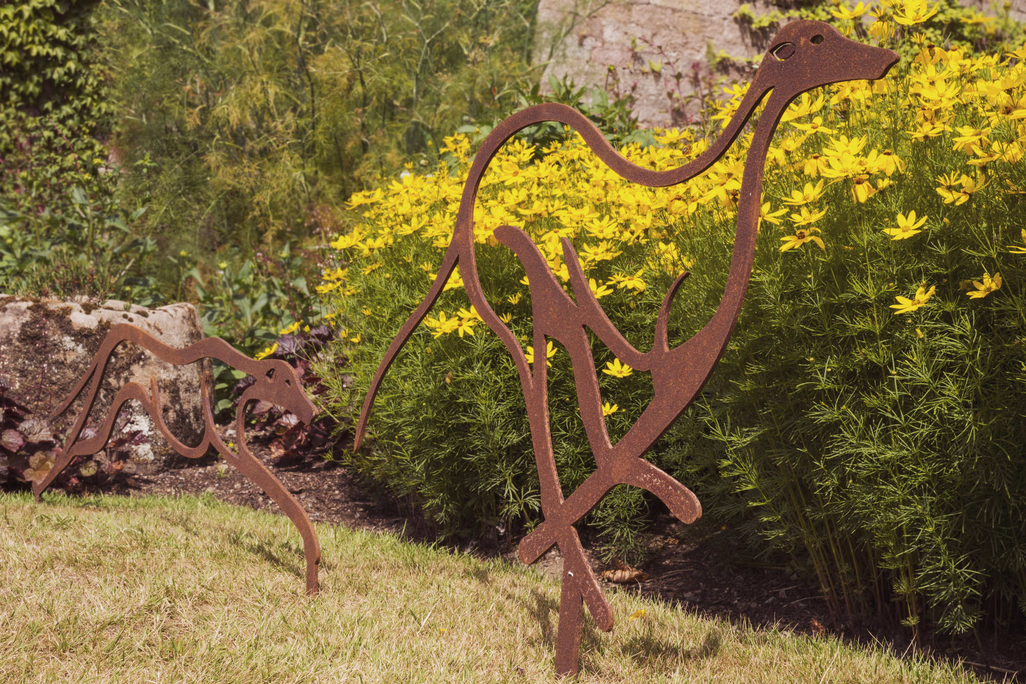 greyhounds garden sculpture - rust