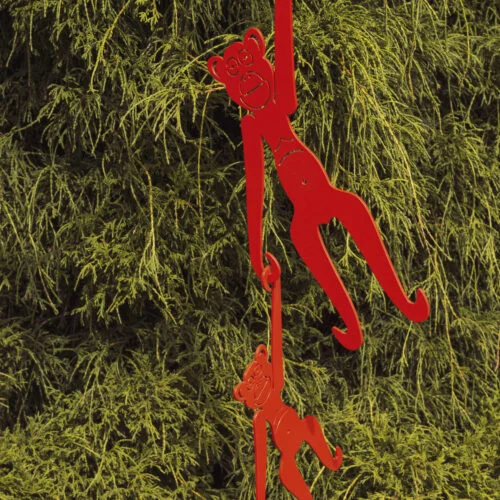 hanging monkeys garden sculpture - red