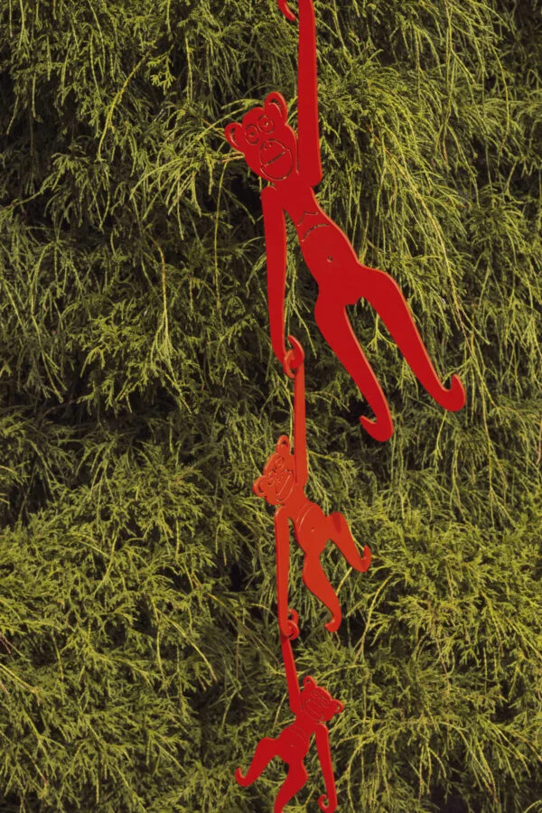 hanging monkeys garden sculpture - red