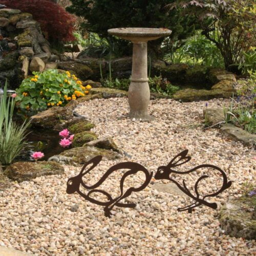 hares garden sculpture - rust