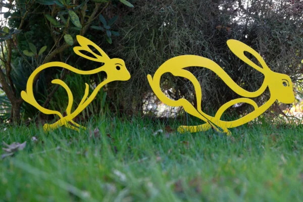 hares garden sculpture - yellow