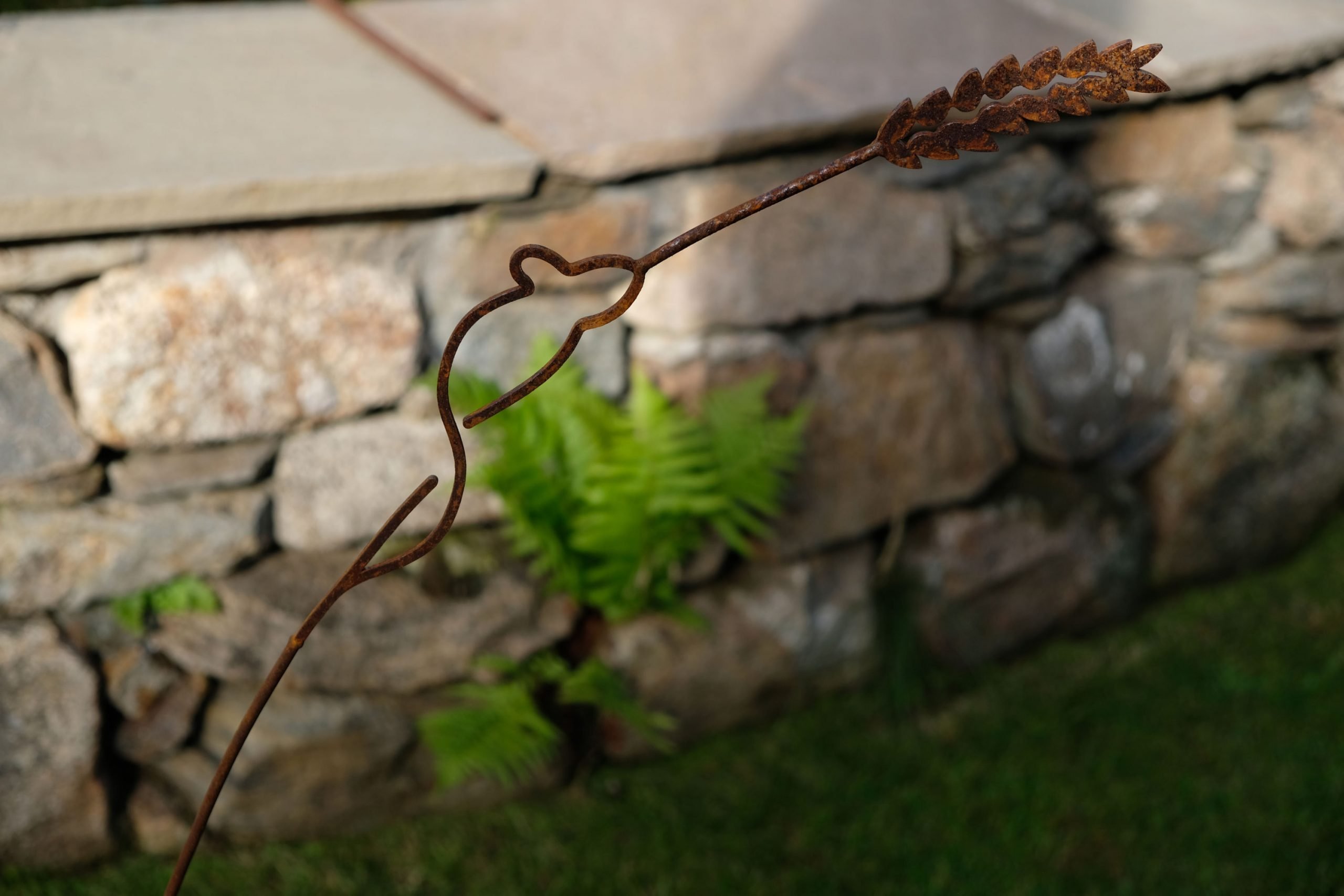 mouse on ear of corn sculpture