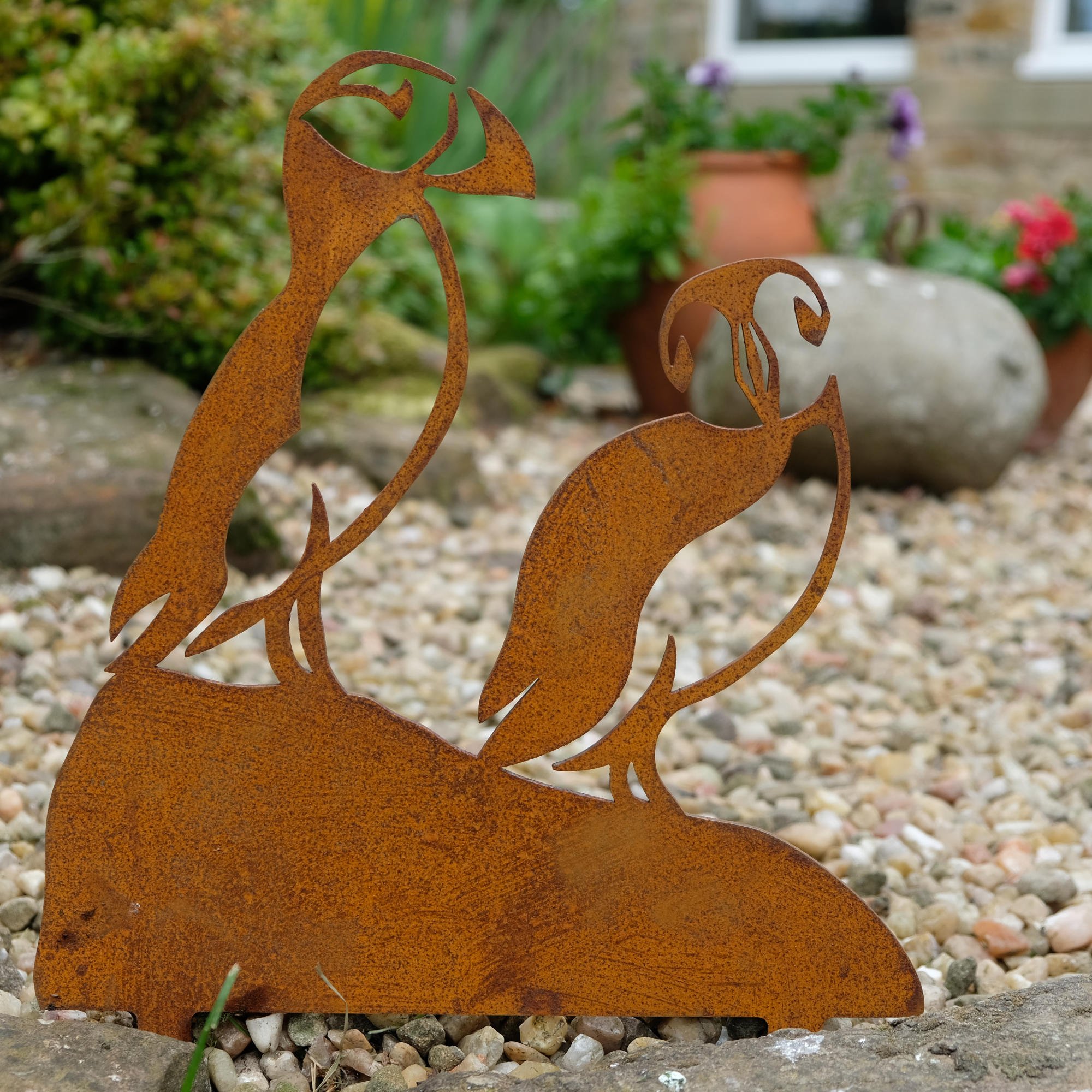 rusty puffins sculpture